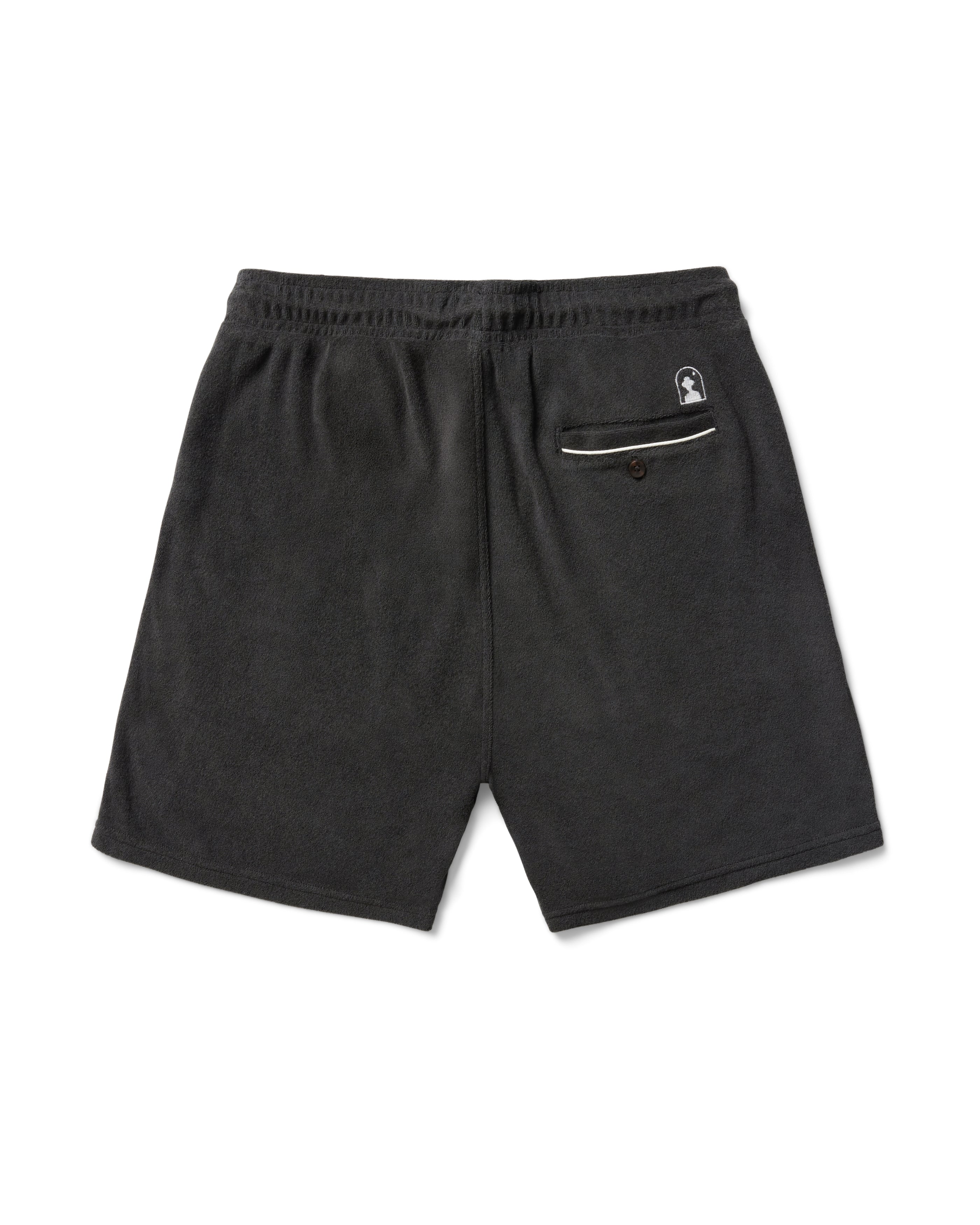 The Gaucho Shorts - Onyx by Dandy Del Mar are made of terry cloth, featuring an elastic waistband and a back pocket with a subtle logo.