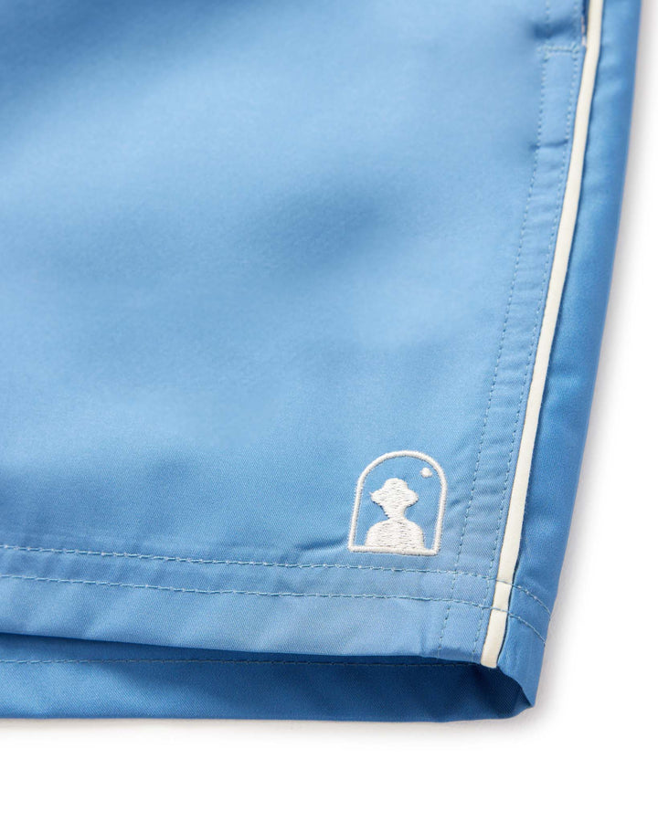 blue colour shorts with the logo of dandy del mar